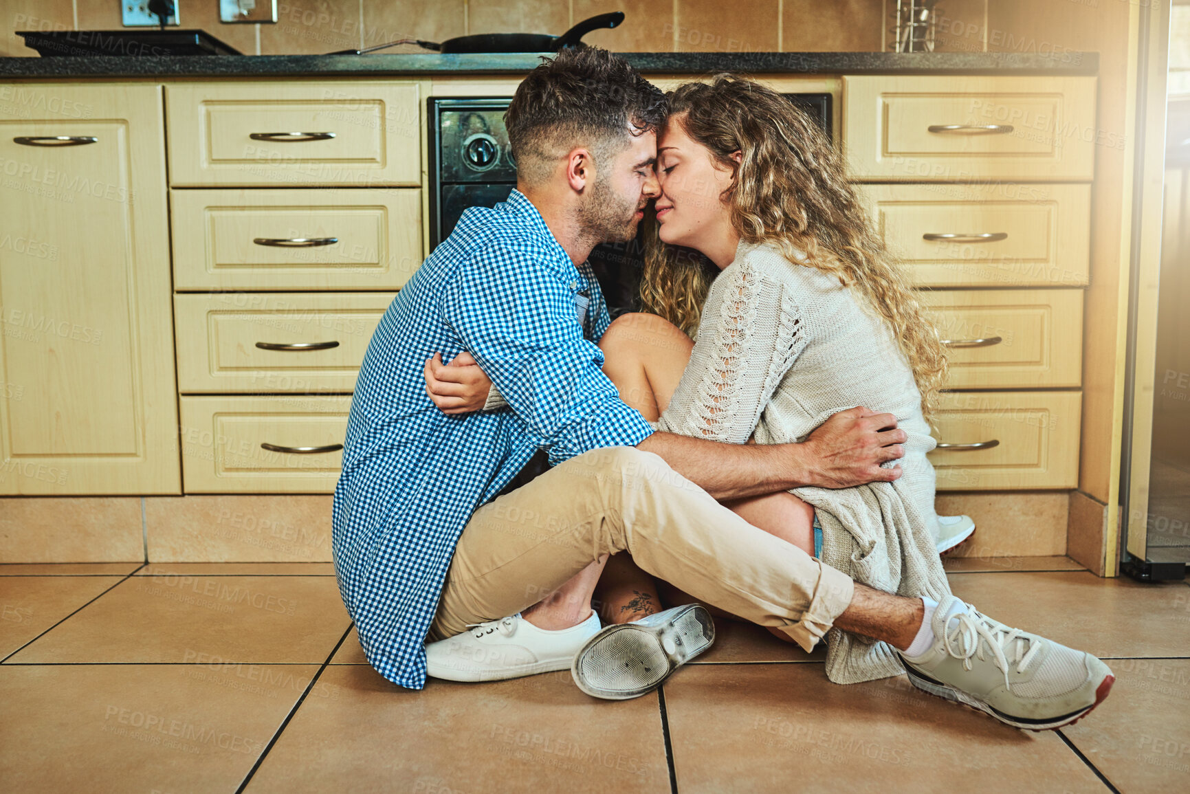 Buy stock photo Floor, affection or couple hug in home for love with support, peace or soulmate partner. Relax, morning or people on ground bonding in relationship together for embrace, romance or break in Spain