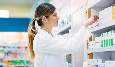 Buy stock photo Pharmacy, product shelf and happy woman, pharmacist or chemist search for pills, supplements or pharmaceutical. Hospital retail dispensary, medicine and medical person fixing box package display