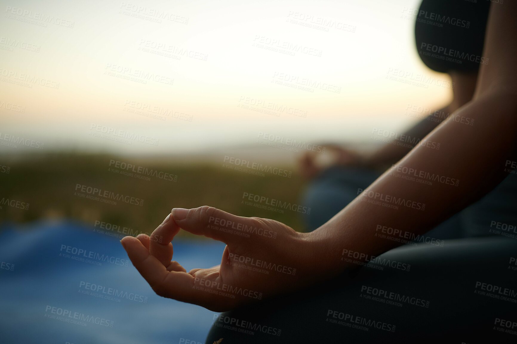 Buy stock photo Hand, meditation and yoga with person outdoor for balance, inner peace or zen closeup in nature. Health, holistic and wellness with mudra of yogi person for awareness, mindfulness and spirituality