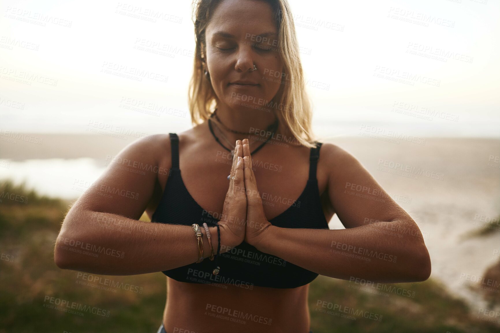 Buy stock photo Yoga, prayer hands and woman at sea for peace, spiritual healing and meditation to align chakra. Fitness person, posture or pilates in nature for zen, mental health balance and stress relief for care