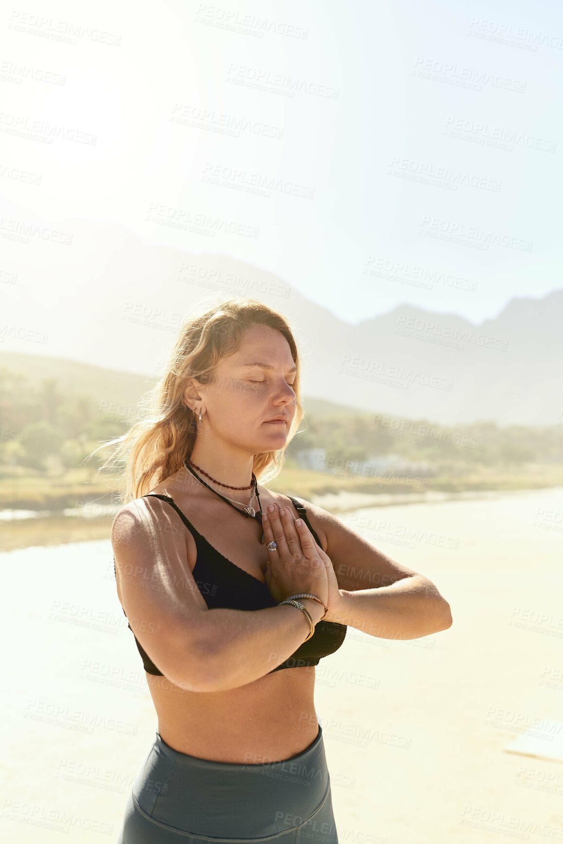 Buy stock photo Namaste, meditation and woman on beach with zen, health or wellness for holistic outdoor care. Peace, relax and girl at ocean for mindfulness, calm practice and yoga in nature for spiritual wellbeing