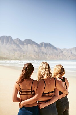 Buy stock photo Back, fitness and hugging with friends on beach together for cardio, training or yoga in summer. Exercise, love and wellness with runner woman group outdoor on sand by ocean or sea for workout