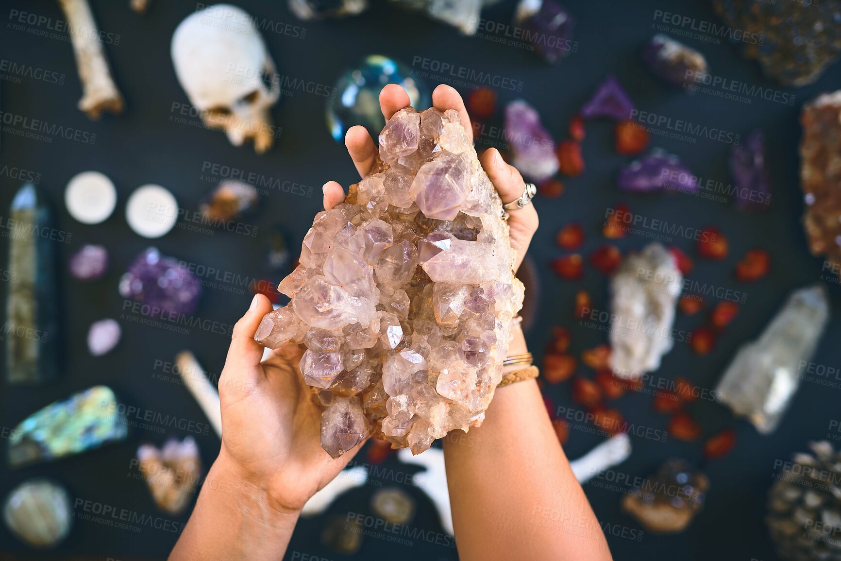 Buy stock photo Hands, above and person with crystals, healing and natural minerals, reiki and health with spirit rock. Closeup, gem and energy stone with faith, spiritual and synergy with occult and geology