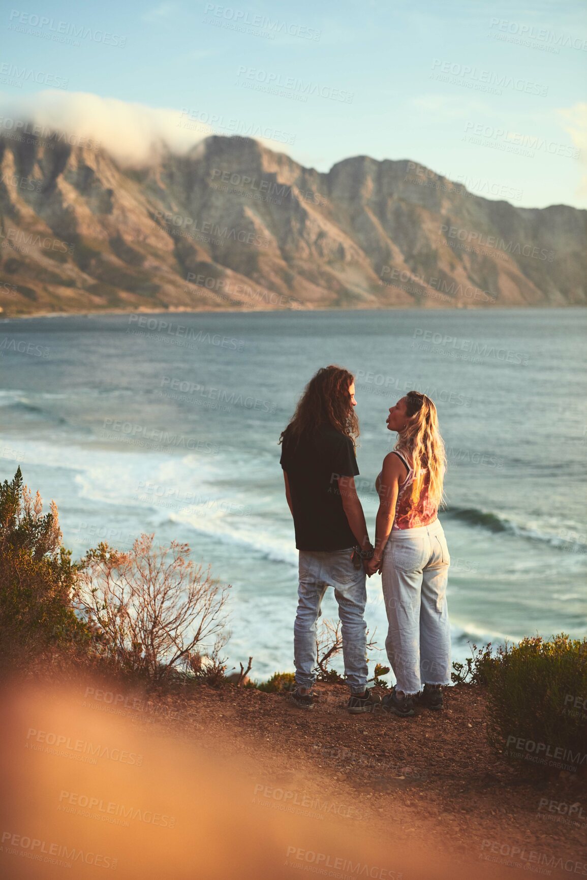 Buy stock photo Couple, mountain and ocean for romance, travel and tropical holiday outdoor with love on weekend break. Man, woman and sea view for relax, trip and vacation with valentines day, date or holding hands