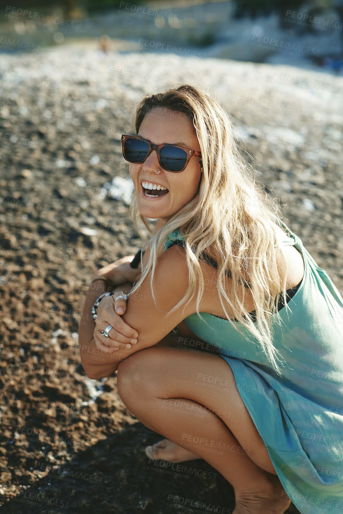 Buy stock photo Happy woman, rock and portrait for travel, relax and tropical holiday outdoor with fun on weekend break. Female person, nature and smile for chill, trip and vacation with sunglasses, tattoo and joy