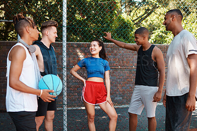 Buy stock photo Basketball, gen z and friends outdoor on sport court with fence, discussion and exercise break. Fitness, team and diversity with workout and training for game with people together with conversation