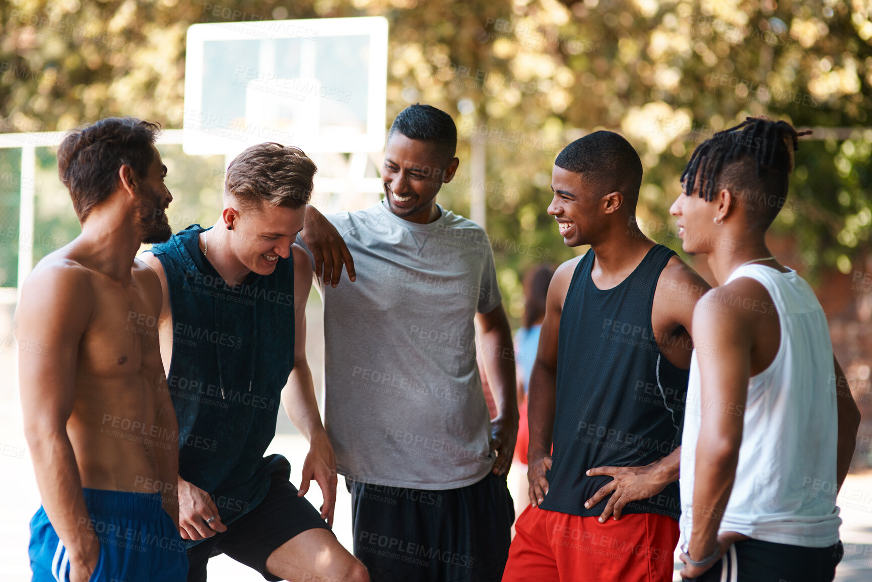 Buy stock photo Team, basketball and happy people on court talking for match, fitness exercise and wellness. Relax, athletes or group of healthy players on break with smile for sports chat, workout and outdoor game