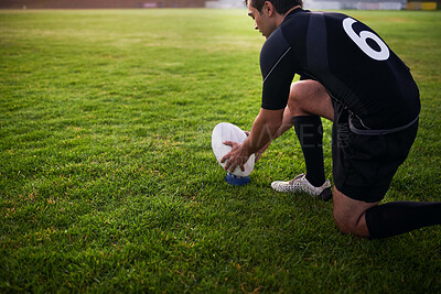 Buy stock photo Rugby, match and man with ball, outdoor and performance for practice, game and fitness for athlete. Playground, grass and professional with strength, player and training for football and person