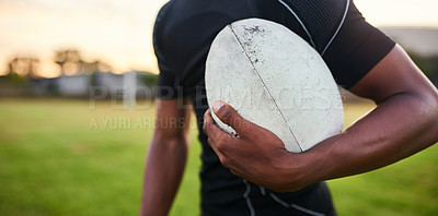 Buy stock photo Rugby, field and hands of man with ball for game, tournament and competition preparation. Closeup, athlete and trainer in sports stadium for fitness, training plan or skill development in New Zealand