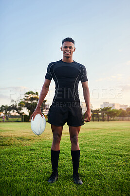 Buy stock photo Rugby, portrait and happy man with ball for sports, game or competition at pitch. Player, smile and confidence of athlete at field for training match, exercise and fitness workout outdoor in Brazil