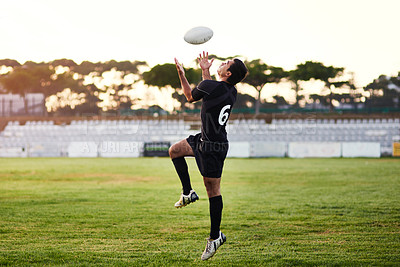 Buy stock photo Man, play and rugby with ball for outdoor, game or challenge in exercise, wellness or fitness. Male person, athlete and recreation facility on pitch for match, sports and training in stadium or arena