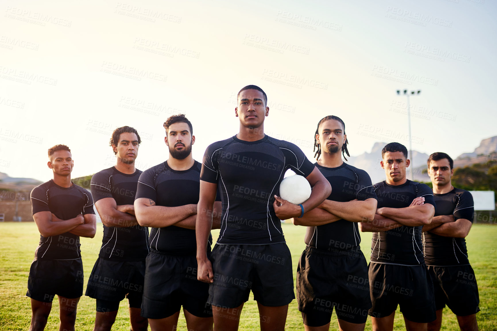 Buy stock photo Men, portrait or team with arms crossed in rugby on field for sport game, group or challenge. Ball, ready or serious athlete players in row for confidence, pride or tournament competition on stadium