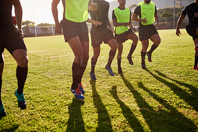 Buy stock photo Sports, men and legs with warm up for rugby, competition game and practice with training for tournament. Stadium, team and players with running for fitness, endurance and match with club by closeup