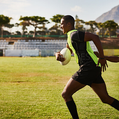 Buy stock photo Fitness, running and man with ball, rugby and training for competition, field and performance for match. Playground, speed and player with energy, exercise and practice for football, sport or outdoor