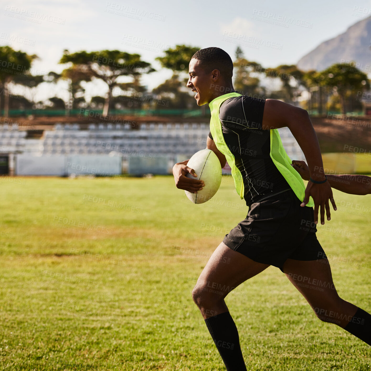 Buy stock photo Fitness, running and man with ball, rugby and training for competition, field and performance for match. Playground, speed and player with energy, exercise and practice for football, sport or outdoor