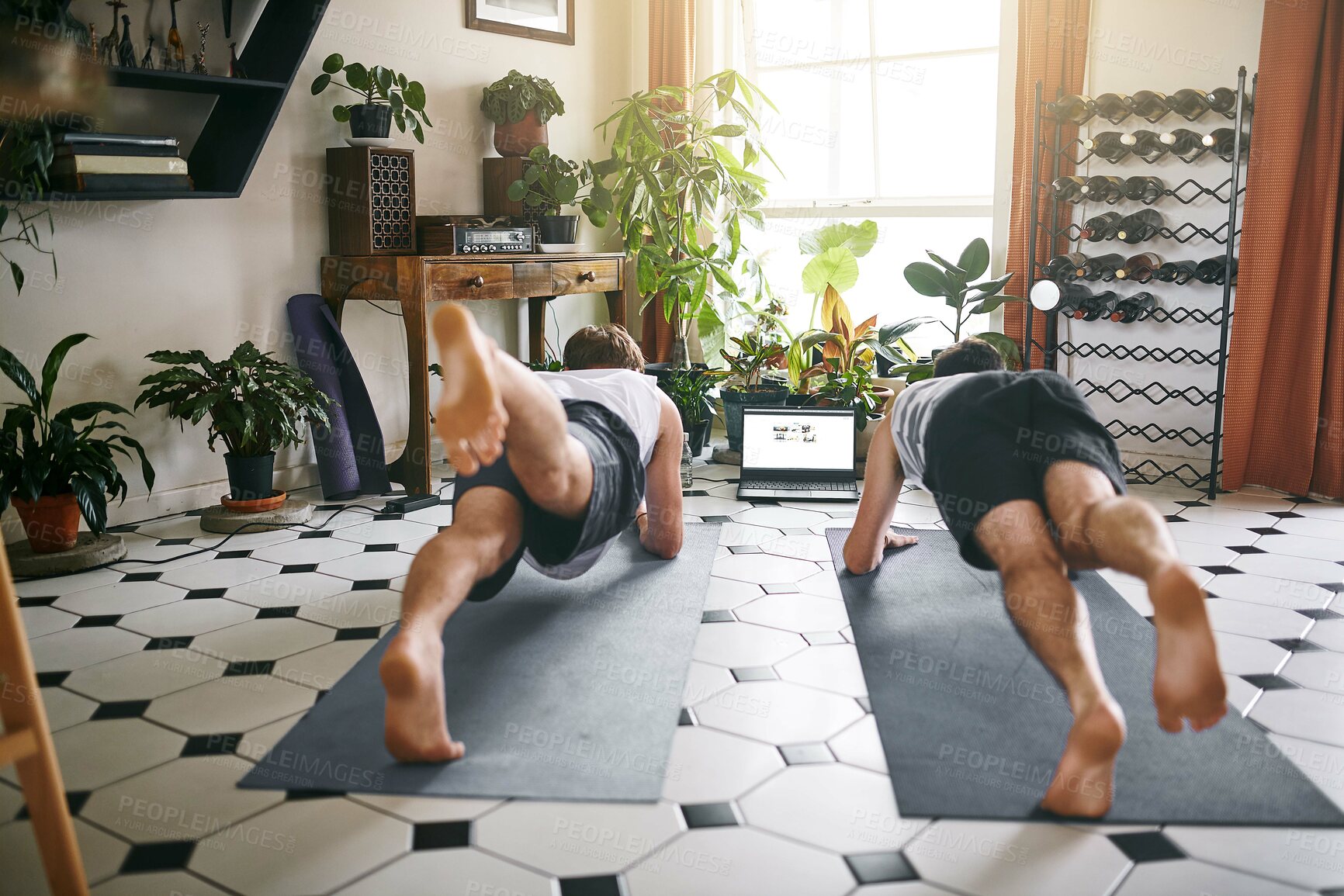 Buy stock photo Men, stretching and back with laptop screen for online class, streaming or tutorial on floor at home. Male people, friends and pilates with computer for fitness guide, routine tips or workout on mat