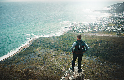 Buy stock photo Hiking, thinking and environment with man on mountain for explore, travel and adventure. Challenge, wellness and holiday with person and trekking in nature for backpacking, relax and camping vacation