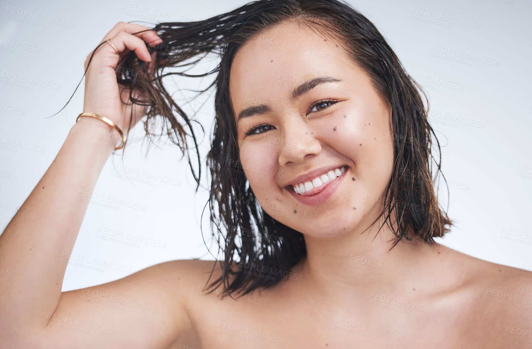 Buy stock photo Portrait, washing and woman with wet hair, cosmetics or dermatology on white studio background. Face, person or model with smile, grooming routine or treatment with pride, wellness with shine or glow