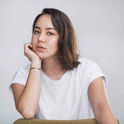 Buy stock photo Asian woman, portrait or natural beauty with tshirt for casual style or clothing on a white studio background. Young gen z, female person or attractive model for cool expression or confidence in Asia