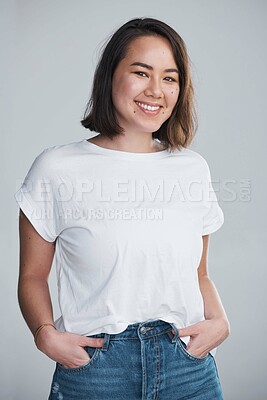 Buy stock photo Asian woman, portrait and smile with fashion in studio for startup retail buyer, sustainability clothing and confidence. Happy person, face and pride for upcycling small business on gray background