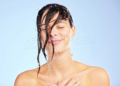 Buy stock photo Water, shower and beauty for woman in studio, haircare and shampoo on white background. Grooming, wash or selfcare for hygiene for smile and female person, wellness and liquid for body care hydration