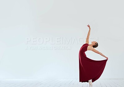 Buy stock photo Woman, ballet and performance grace in studio, learning dance and practice rehearsal in elegant dress. Person, mockup space and strong athlete for balance, theatre training and creative dancer girl