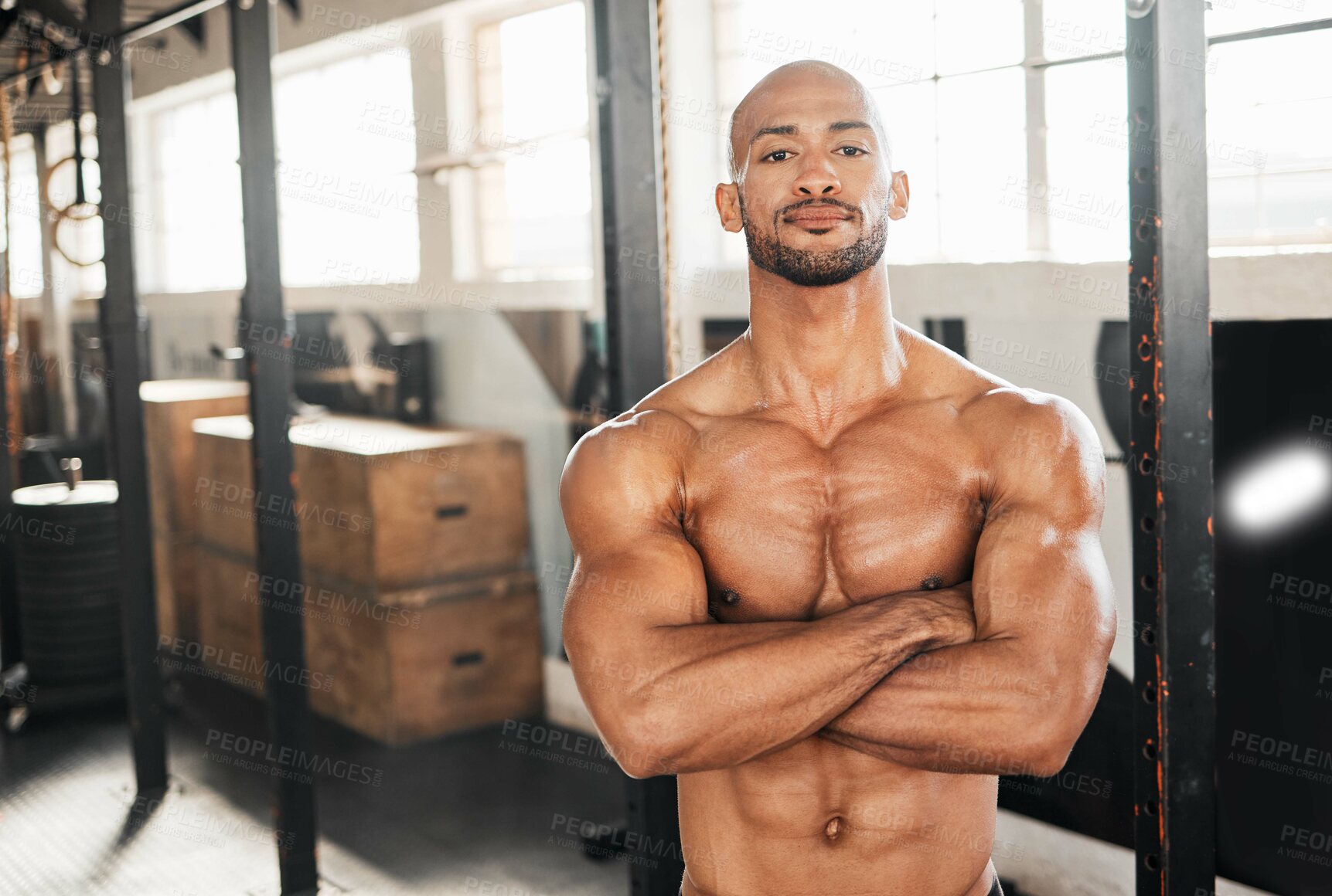 Buy stock photo Portrait, fitness and happy man with arms crossed for body health, muscle or workout with pride in sports gym. Face, shirtless or confident bodybuilder, strong athlete or smile for exercise in Brazil