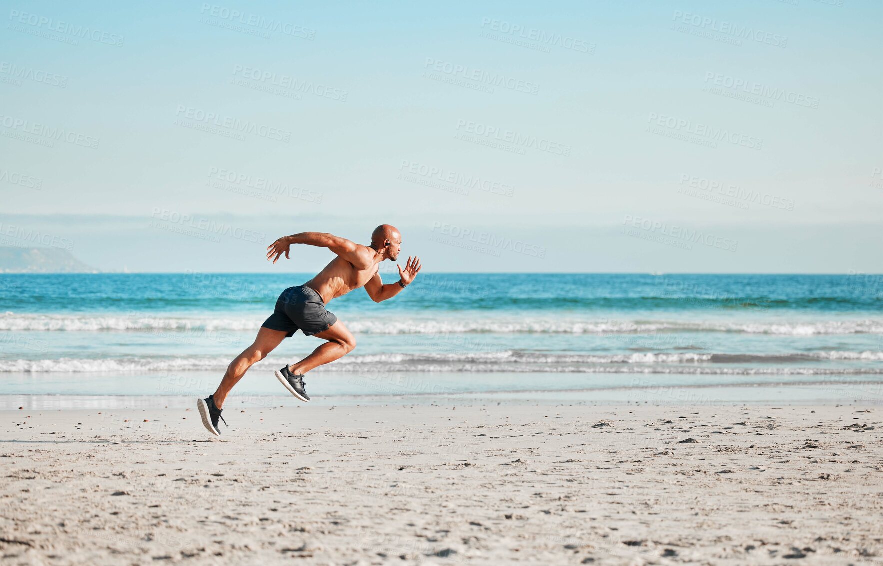 Buy stock photo Blue sky, profile and running with man on beach for cardio, exercise or fitness routine in summer. Sand, sports and training with shirtless African athlete or runner on coast for speed or workout