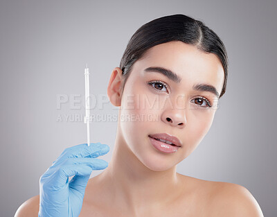 Buy stock photo Woman, portrait and plastic surgery, beauty and injection in studio for lip filler, skincare and collagen. Spa treatment, medical and cosmetics with face of person in grey background for facial