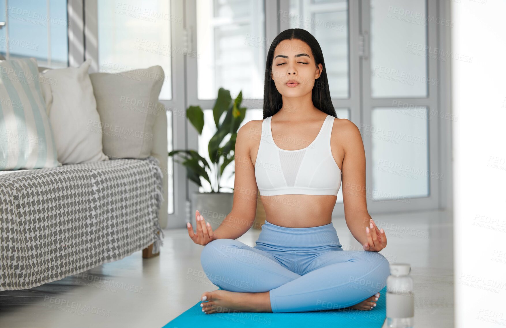 Buy stock photo Yoga, woman and lotus in home for peace, meditation and wellness on mat. Fitness person, zen and healthy body in living room for spiritual healing, positive mental health and calm to align chakra