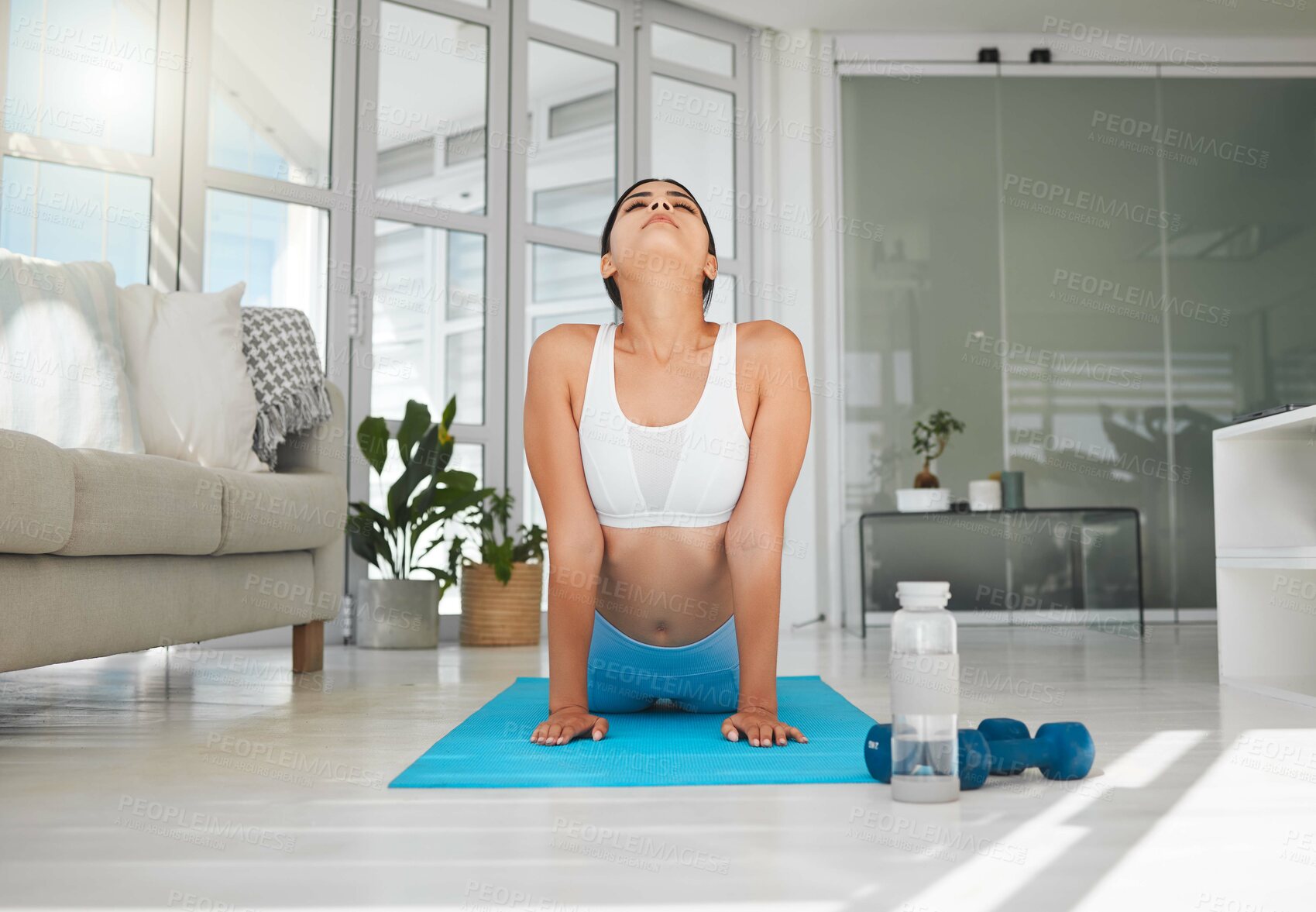 Buy stock photo Yoga, stretching and peace with woman in living room for health, fitness and mindfulness workout. Wellness exercise, strong and warm up with person and home gym for pilates, calm and balance