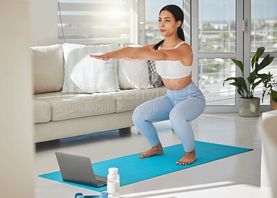 Buy stock photo Laptop, squat and fitness with woman in living room for health, balance and online workout. Wellness exercise, strong and virtual class with person and home gym for streaming, body and training