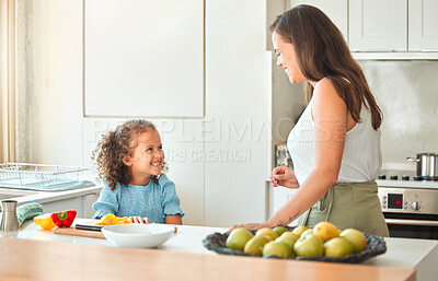 Buy stock photo Mother, child and happy with smile, help and guidance for cooking and support in kitchen. Woman, girl and learning to cut vegetables for dinner, meal and healthy salad diet with fun bonding at home