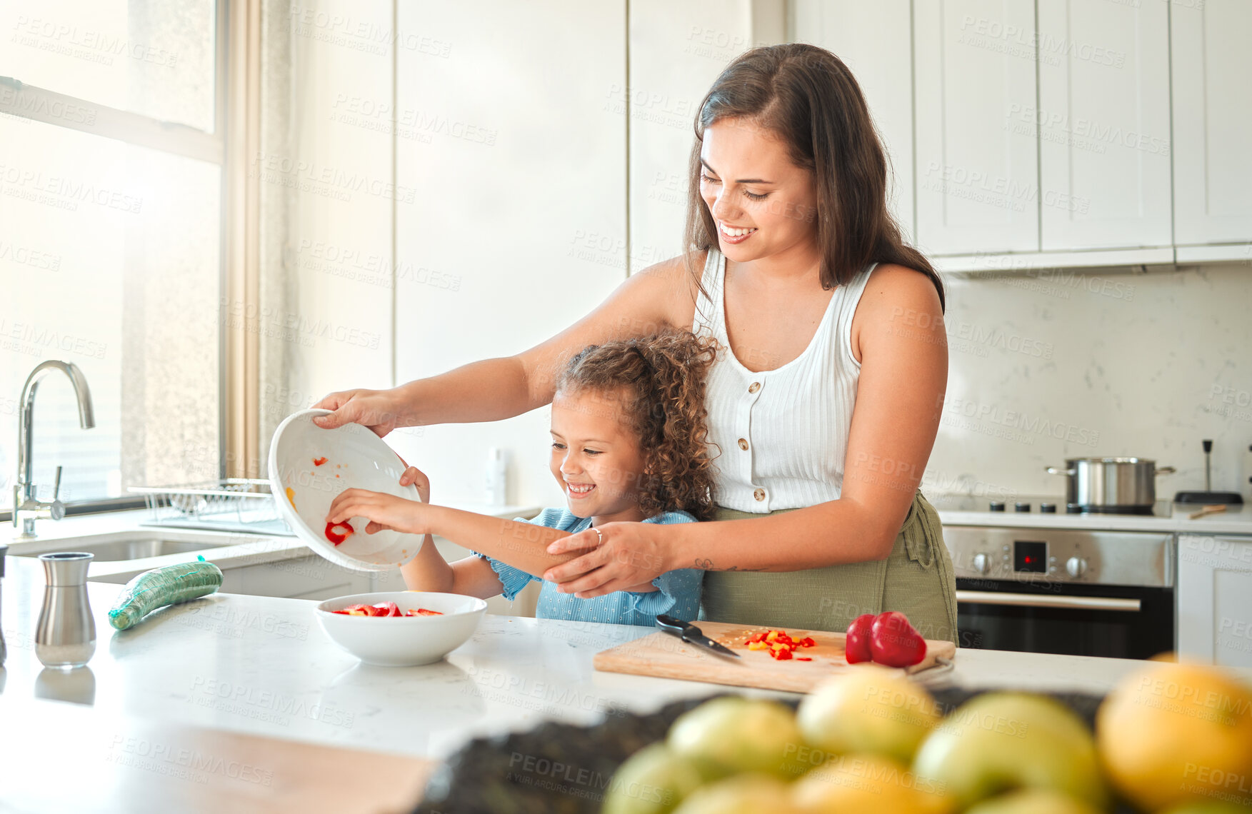 Buy stock photo Mom, girl and cooking with smile, help and guidance for teaching and chopping in kitchen. Woman, child and learning to cut vegetables for dinner, meal and healthy diet with fun bonding at home