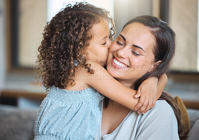 Buy stock photo Hug, kiss and mom on couch with child for morning bonding, gratitude and support in fun family home. Love, mother and daughter on sofa with happy embrace, care and connection in living room together.