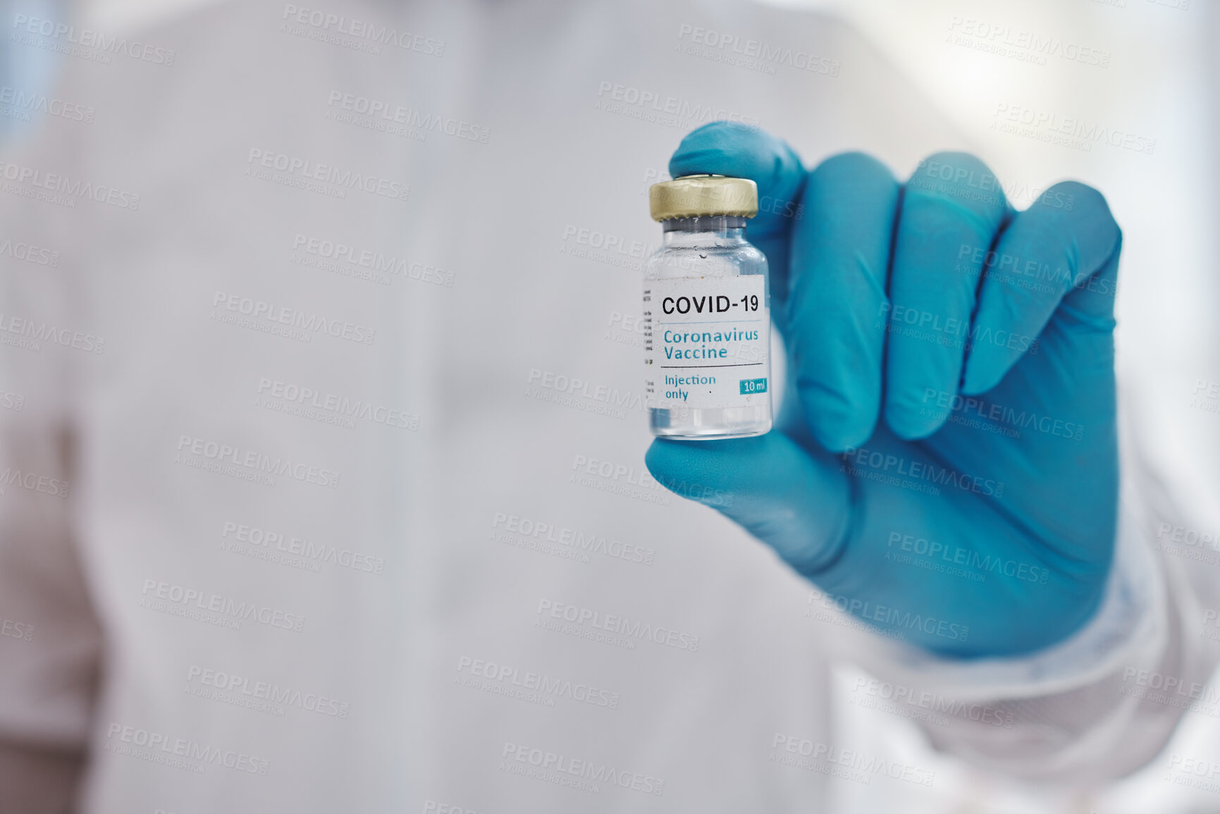 Buy stock photo Doctor, hand and vial in hospital for Covid 19, healthcare and routine vaccination at space. Person, medical expert or bottle in clinic for science, research or pandemic immunity for virus prevention