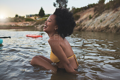 Buy stock photo Laugh, swimming and black woman in lake for vacation, summer holiday and relax in bikini for comedy. Water, swimsuit and girl outdoor in river for adventure, funny and excited to travel for tourism