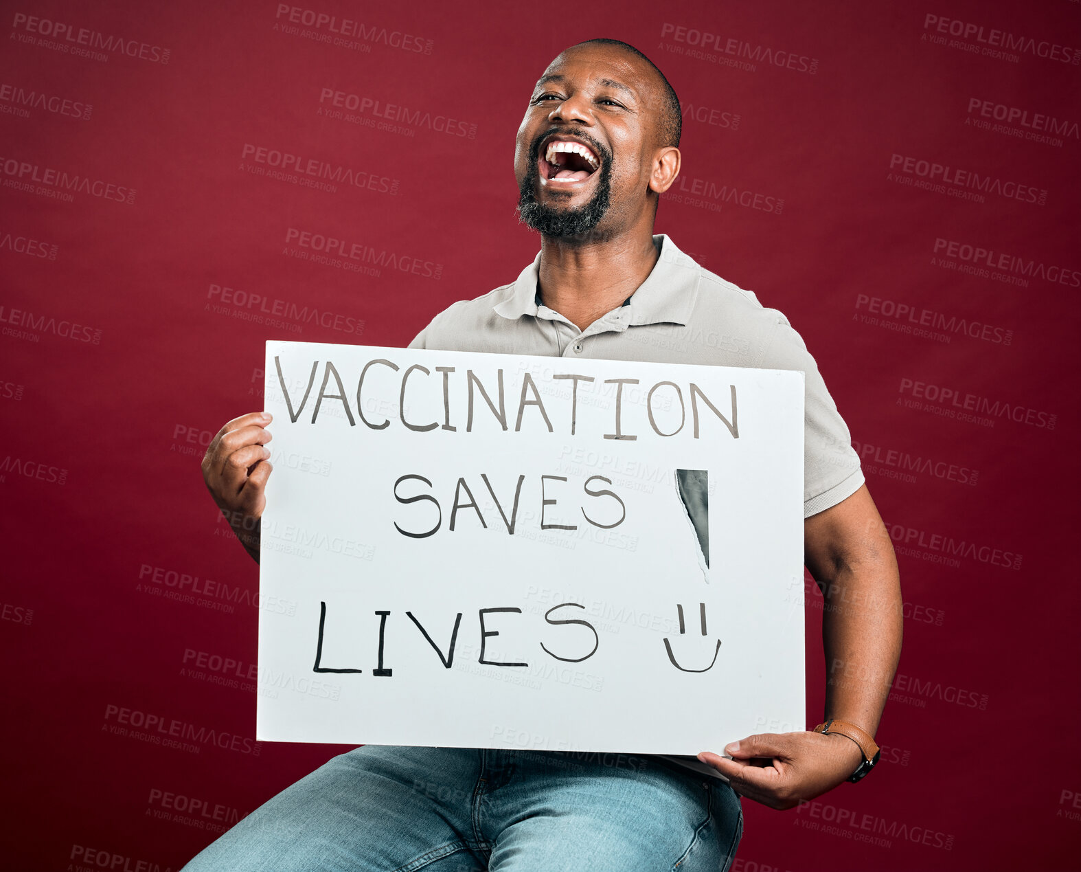 Buy stock photo Happy, black man and vaccine poster in studio for covid19 attention, healthcare choice and medical cure. Smile, person and billboard information with treatment advice, virus safety and red background