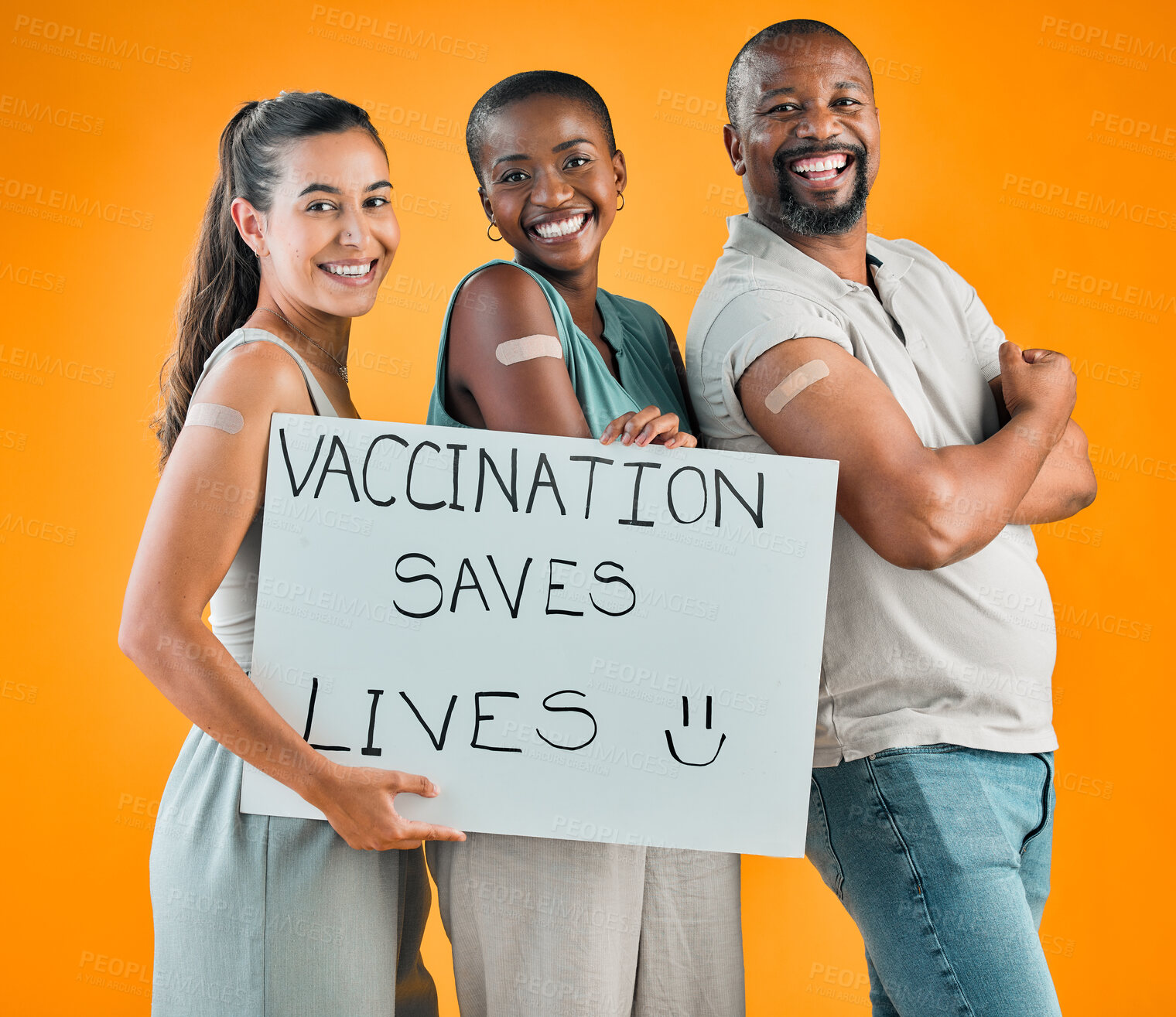 Buy stock photo Poster, smile and vaccine with portrait of people in studio on orange background for healthcare or medical. Arm, pandemic and vaccination saves lives sign with happy friends together for support