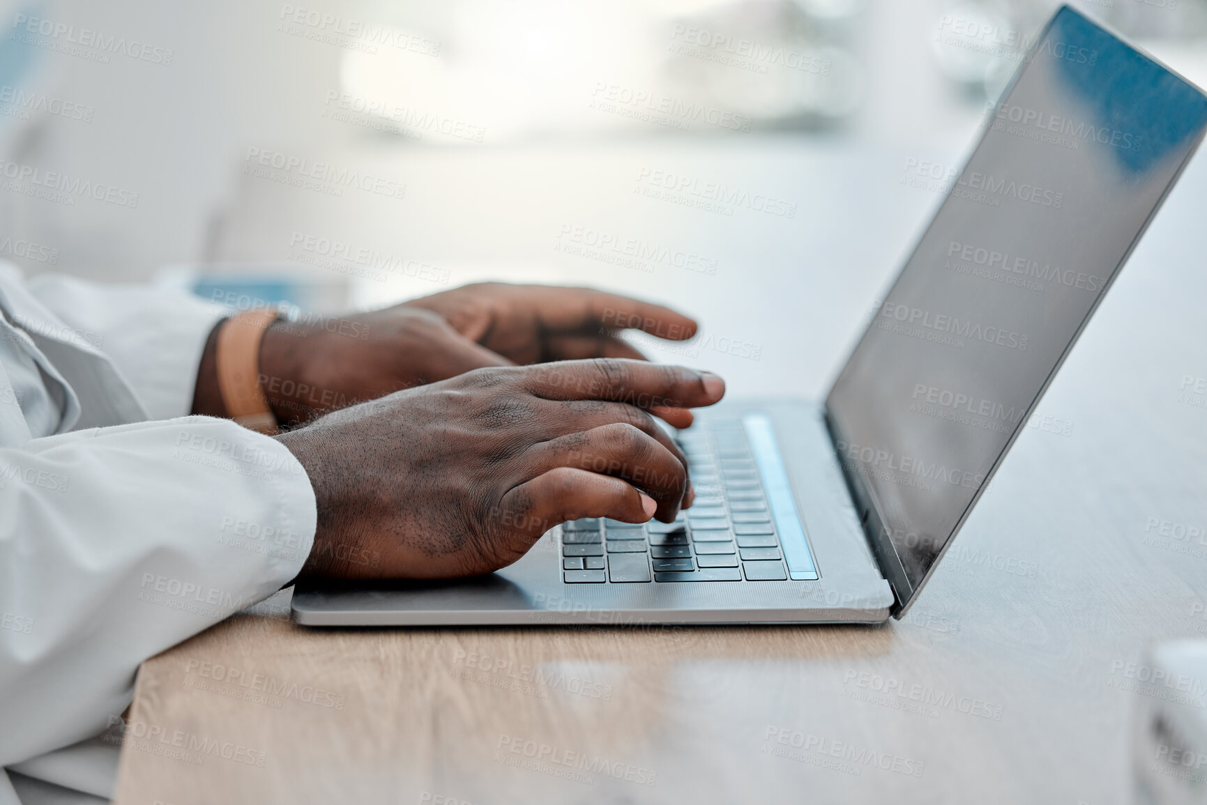 Buy stock photo Hands, laptop and typing with doctor in office at hospital for email communication of diagnosis or results. Computer, healthcare and medical with medicine professional at desk in clinic for feedback