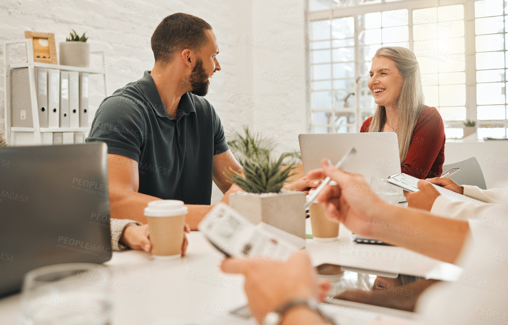 Buy stock photo Business people, laughing and meeting with team for project planning, social or humor at office. Man, woman or creative employees with smile for comedy, funny joke or discussion together at workplace