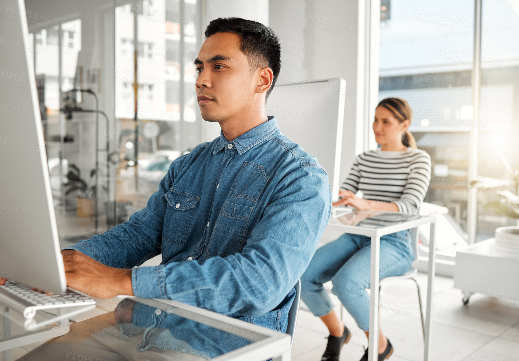 Buy stock photo Office, business and man with computer at desk for information technology, server and system update. Programming, company and developer with tech at work for backend development, testing or debugging