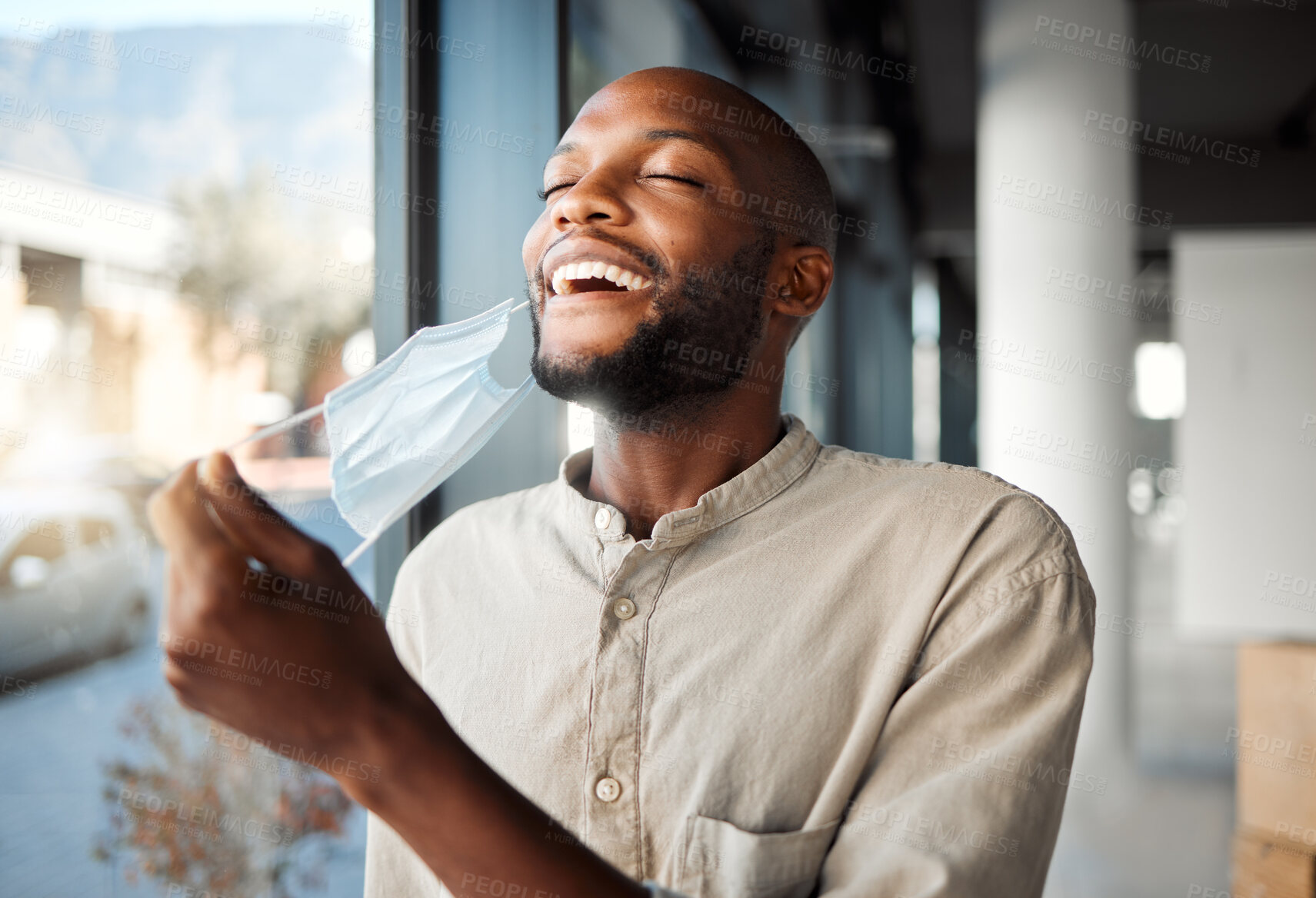 Buy stock photo Black man, remove or smile with face mask for safety, pandemic or fresh air in healthcare awareness. Breathing, protection and illness prevention in office break for covid disease, virus and bacteria