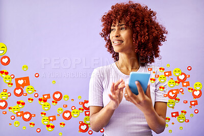 Buy stock photo Phone, social media and emoji notification with a black woman in studio on a purple background for communication. Mobile, app and reaction with a happy young person using technology to like a post