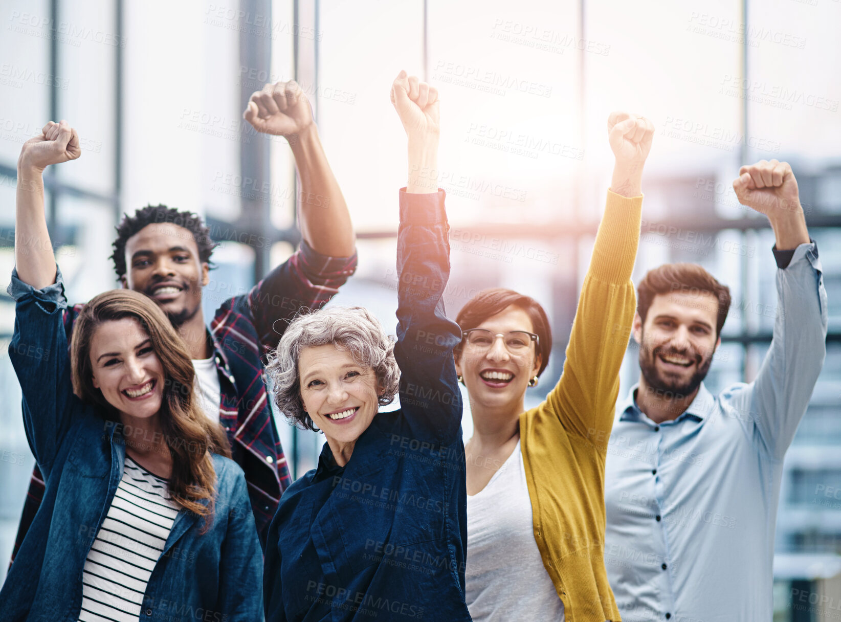 Buy stock photo Celebration, portrait and business team with fist in office for confidence, motivation and teamwork. Happy, success and group of multiracial corporate employees to celebrate achievement in workplace.