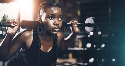 Buy stock photo Fitness, black woman and weightlifting with barbell in gym for intense workout, endurance challenge and strength. Athlete, bodybuilder and weight training at sports center for performance and muscle