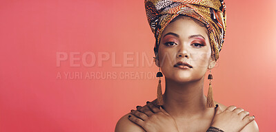 Buy stock photo Woman, portrait and tradition with fashion on studio background for African heritage or culture. Female person, model or head scarf with jewelry for origin, beauty or style on banner or mockup space