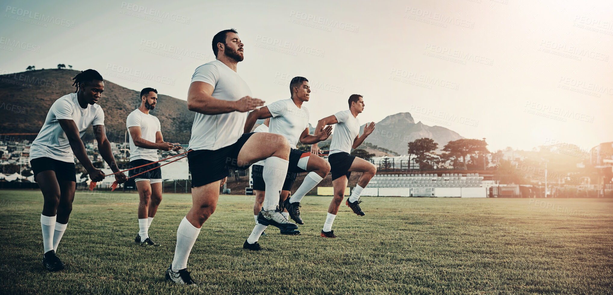 Buy stock photo Sports, rugby and men on field for training, exercise and workout for game or match in morning. Teamwork, collaboration and athletes with practice equipment for challenge, performance and fitness