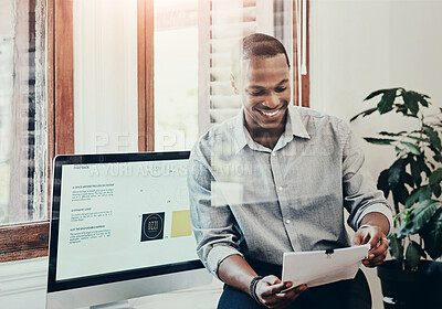 Buy stock photo Computer, reading and happy man in office with paperwork, relax and research for online design. Smile, creative and businessman at desk with documents, ideas and report feedback at digital agency