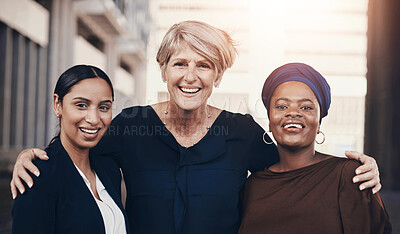 Buy stock photo Happy, portrait and business women with hug for teamwork, inclusion or company growth in city. Female people, group or diversity with smile in confidence for career support, trust or unity in town